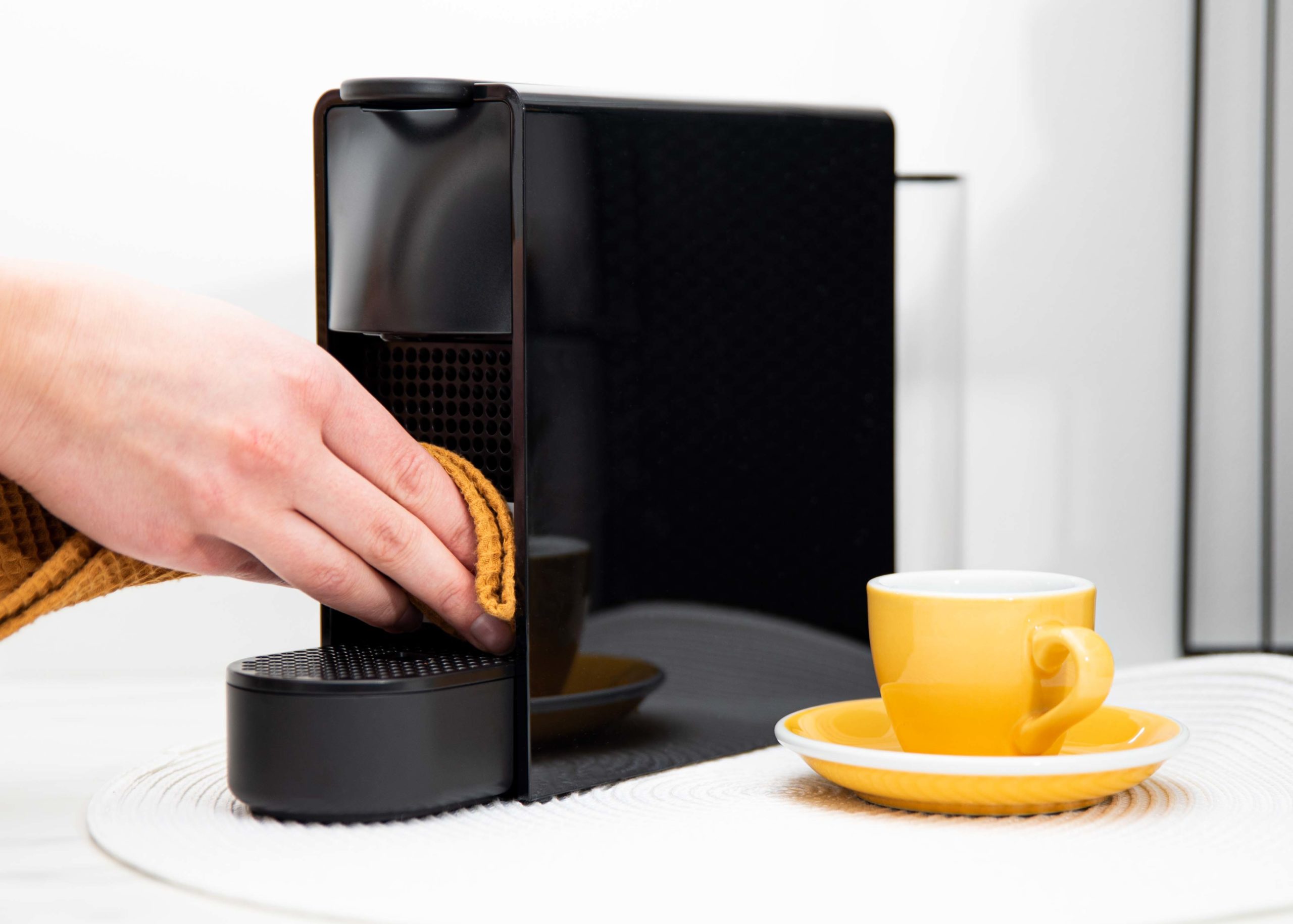 Reinigung einer Nespresso–Kaffeemaschine 